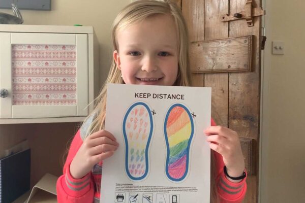 Child-with-footprint-art